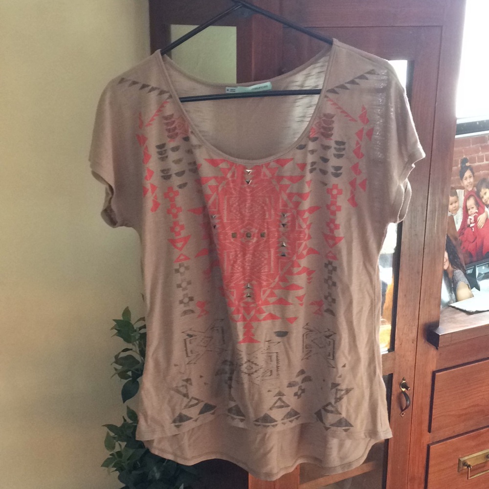 Maurice’s size medium shirt.